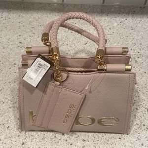 Brand new Bebe purse mauve color